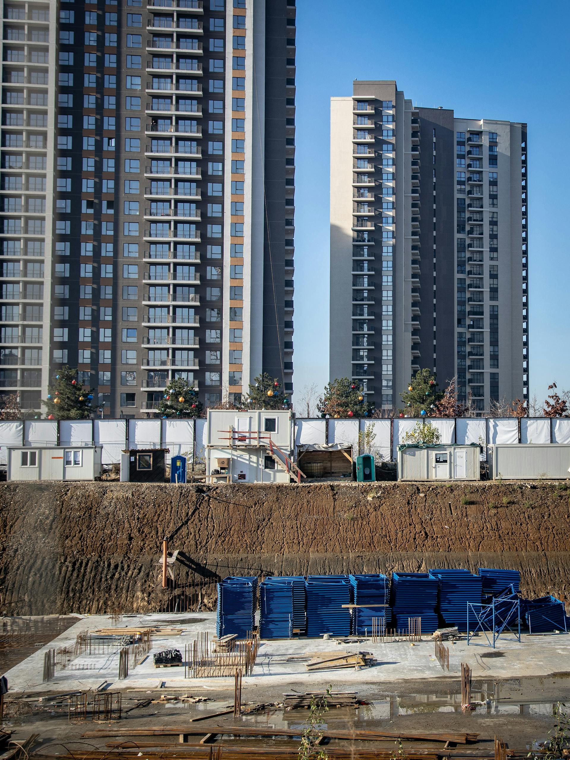 Vertical view of high-rise building construction with modern architecture.
